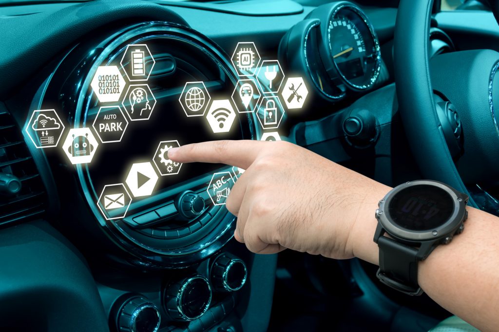 Smart car and of things (IOT) concept. Finger point to car 's