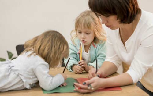 grandmother-granddaughters-playing-together